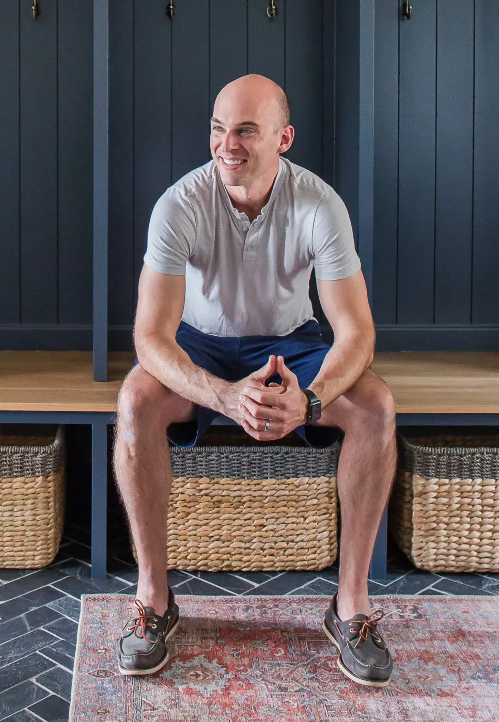 John Kaplar in the Arched Manor mudroom he built